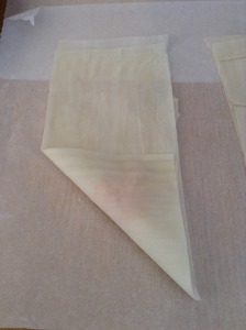 Fold the corner with the feta up, diagonally