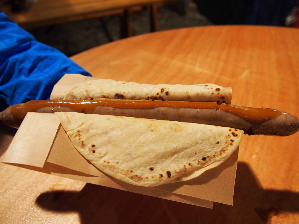 Oslo, Norway Christmas Market-Wild Boar & Moose Bratwurst slathered in sweet mustard and served in a potato wrap